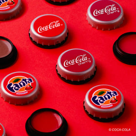 Lip Smacker lip balm trio packaging with Coca-Cola branding