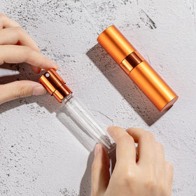 LISAPACK atomizer bottles in a handbag for travel