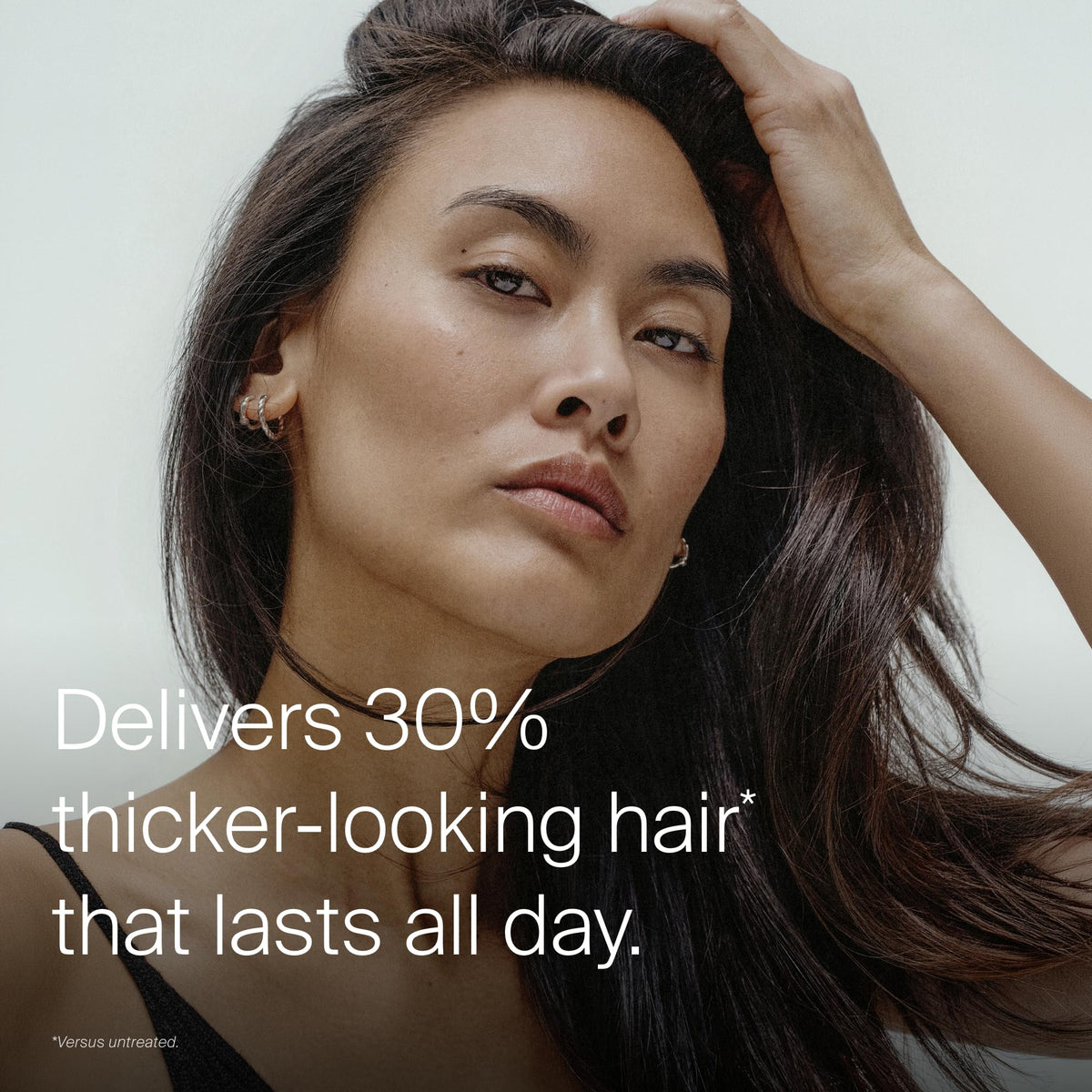 Living Proof Full Thickening Blow-Dry Cream application on hair
