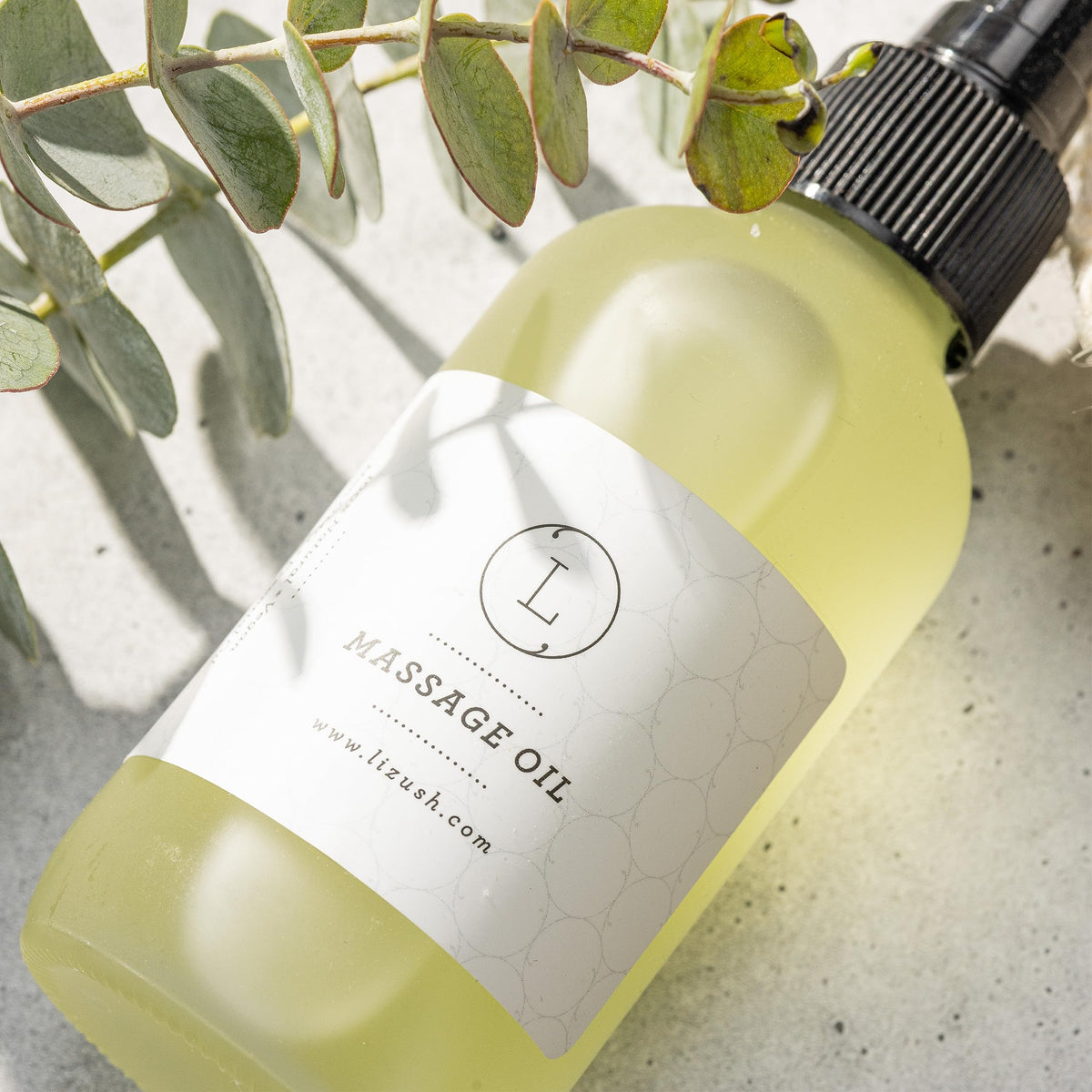 Lizush Eucalyptus Massage Oil frosted glass bottle side view