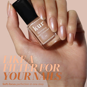 LONDONTOWN kur Illuminating Nail Concealer in Bare bottle with cap