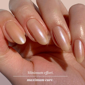 LONDONTOWN kur Illuminating Nail Concealer in Bare on a vanity