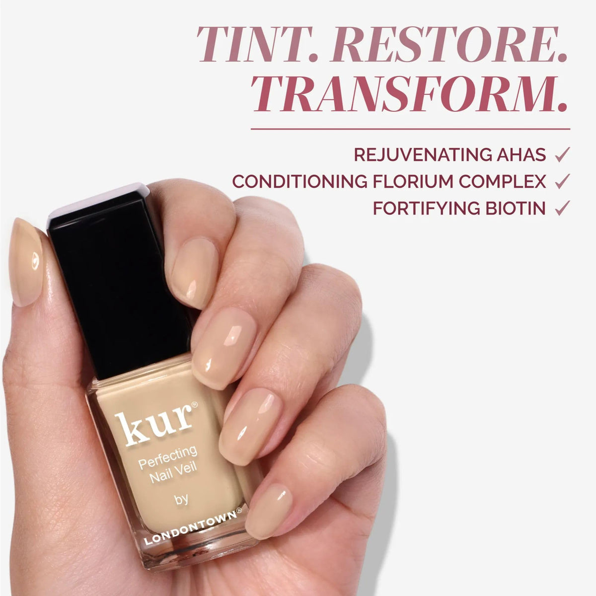 LONDONTOWN kur Perfecting Nail Veil Alabaster Tint on a vanity
