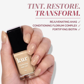 LONDONTOWN kur Perfecting Nail Veil Alabaster Tint on a vanity