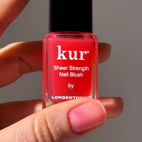 LONDONTOWN Sheer Strength Nail Blush bottle with dewy finish