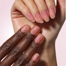 LONDONTOWN Sheer Strength Nail Blush Hibiscus applied on nails