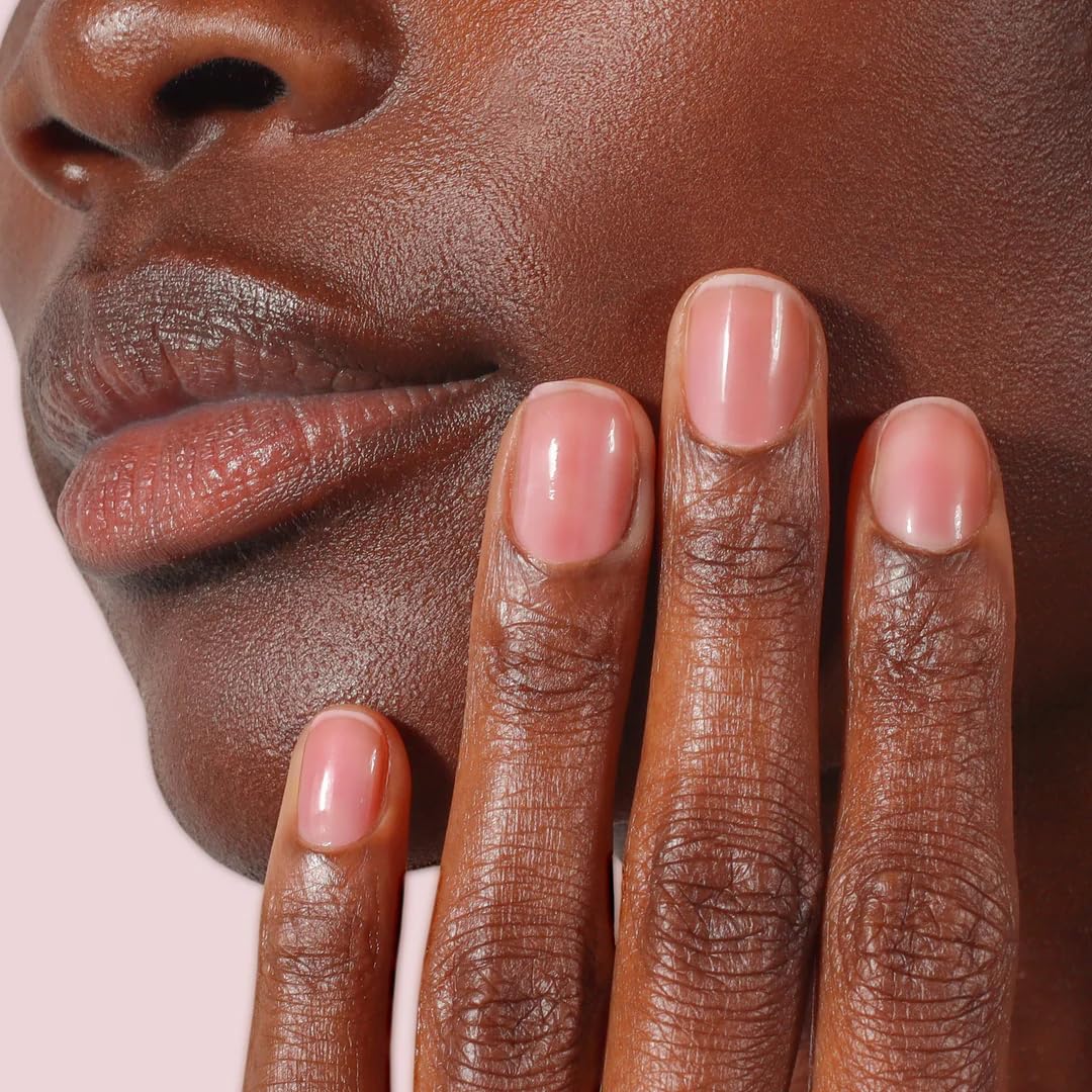 LONDONTOWN Sheer Strength Nail Blush Hibiscus with other nail care products