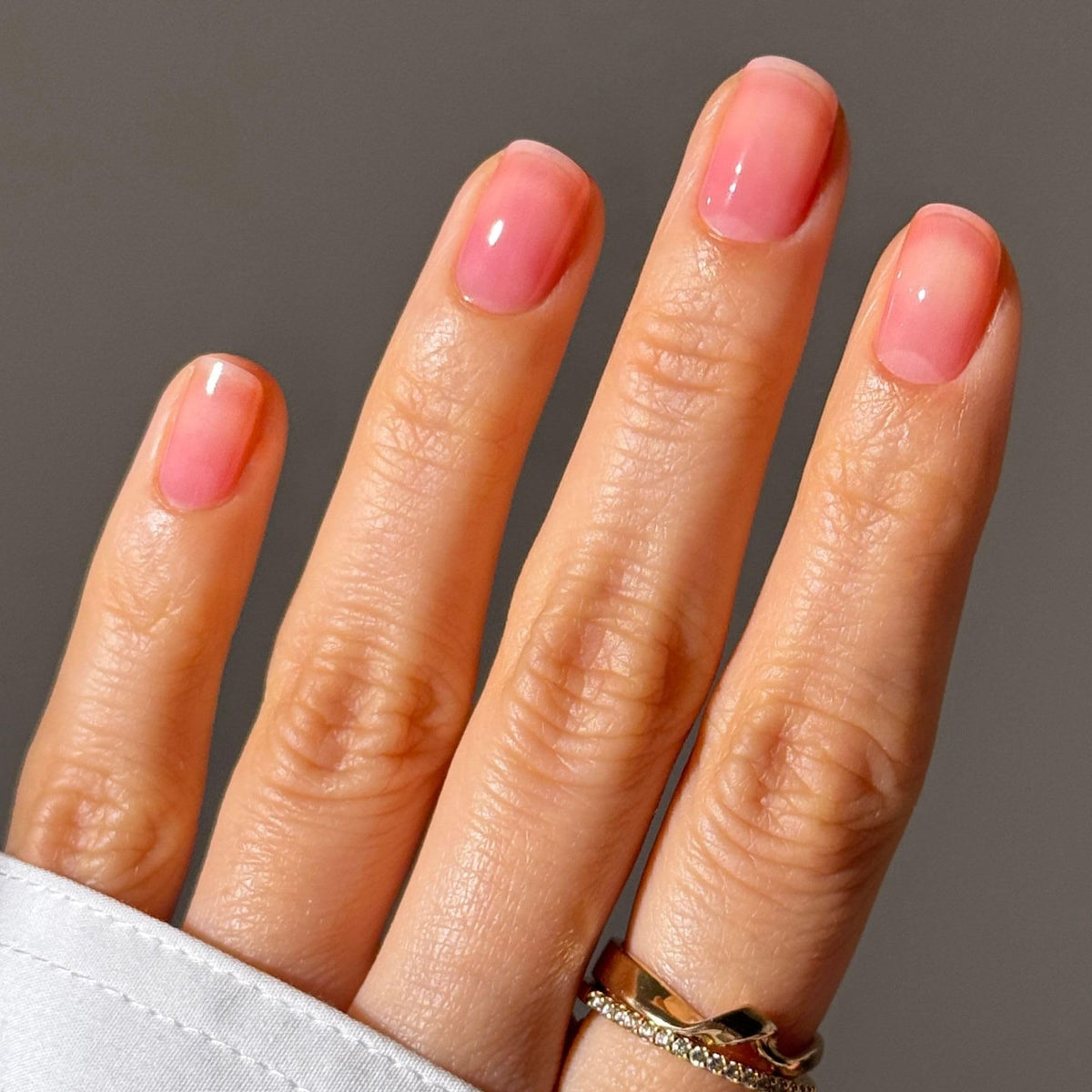LONDONTOWN Sheer Strength Nail Blush showing jelly-like texture