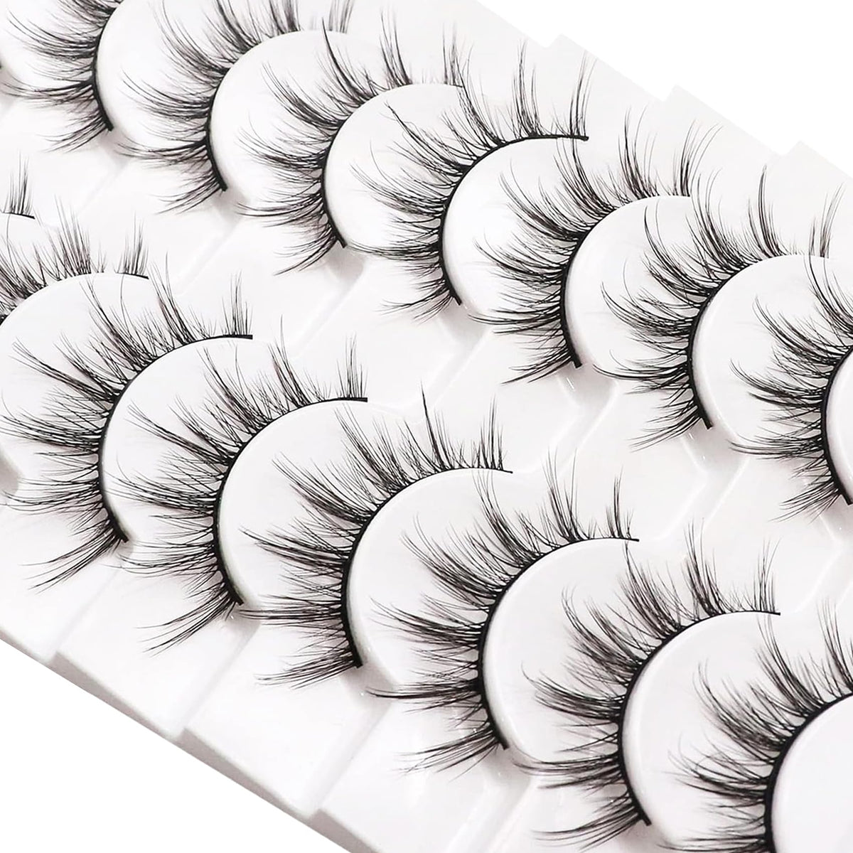 Losha Manga Lashes 6D75 displayed with makeup tools