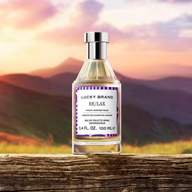 Lucky Brand Lucky You Vibes Re/Lax 3.4oz EDT on a wooden table