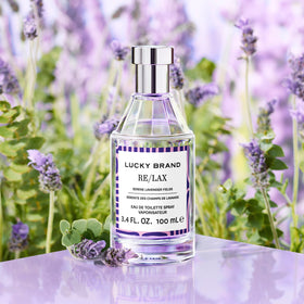 Lucky Brand Lucky You Vibes Re/Lax 3.4oz EDT with lavender background