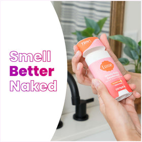 Lume deodorant wipes being held in hand
