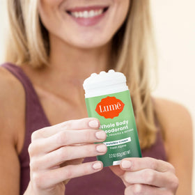 Lume Whole Body Deodorant Cream Stick Fresh Alpine with other personal care items