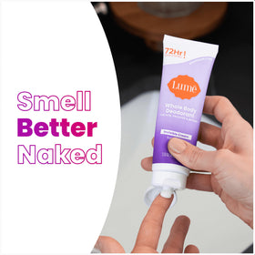Lume Whole Body Deodorant Cream Tube 3 oz in hand for application