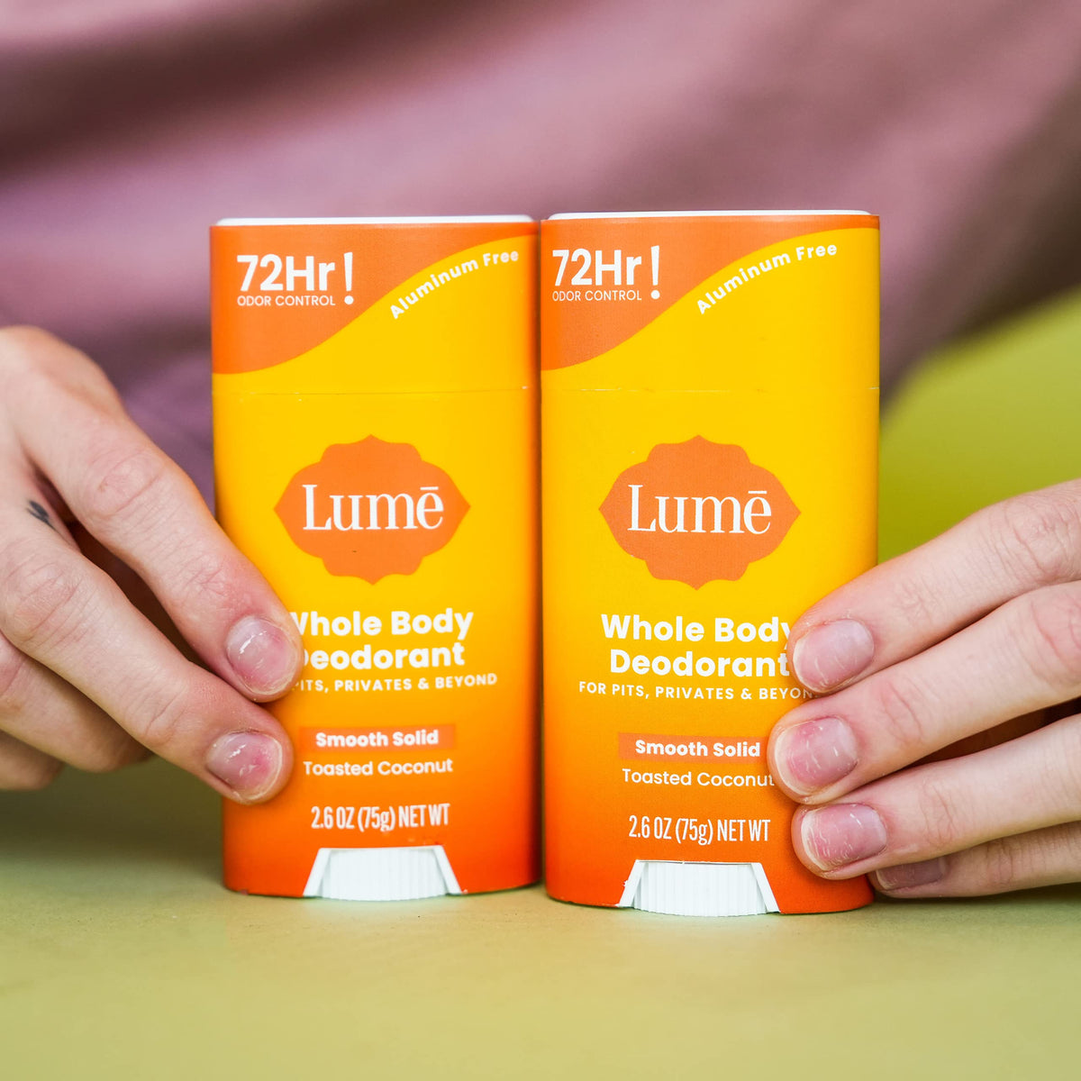 Lume Whole Body Deodorant Solid Stick in hand
