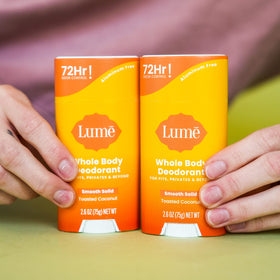 Lume Whole Body Deodorant Solid Stick in hand