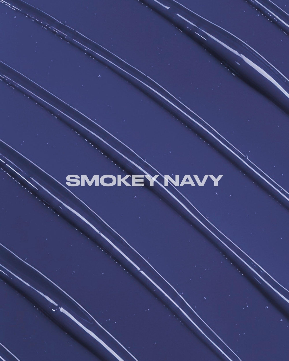 Lunar Tides Smokey Navy hair color in a bathroom setting