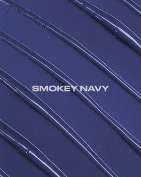 Lunar Tides Smokey Navy hair color in a bathroom setting