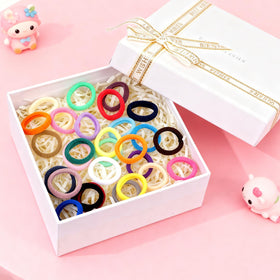 LuSeren baby hair ties in a child's hair for styling