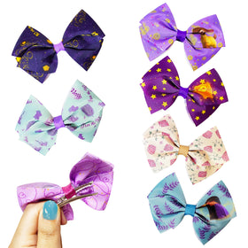 LUV HER Disney Wish Kids Hair Bows on a child's hair