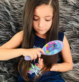 LUV HER hairbrush showing rounded bristles and kid-friendly handle
