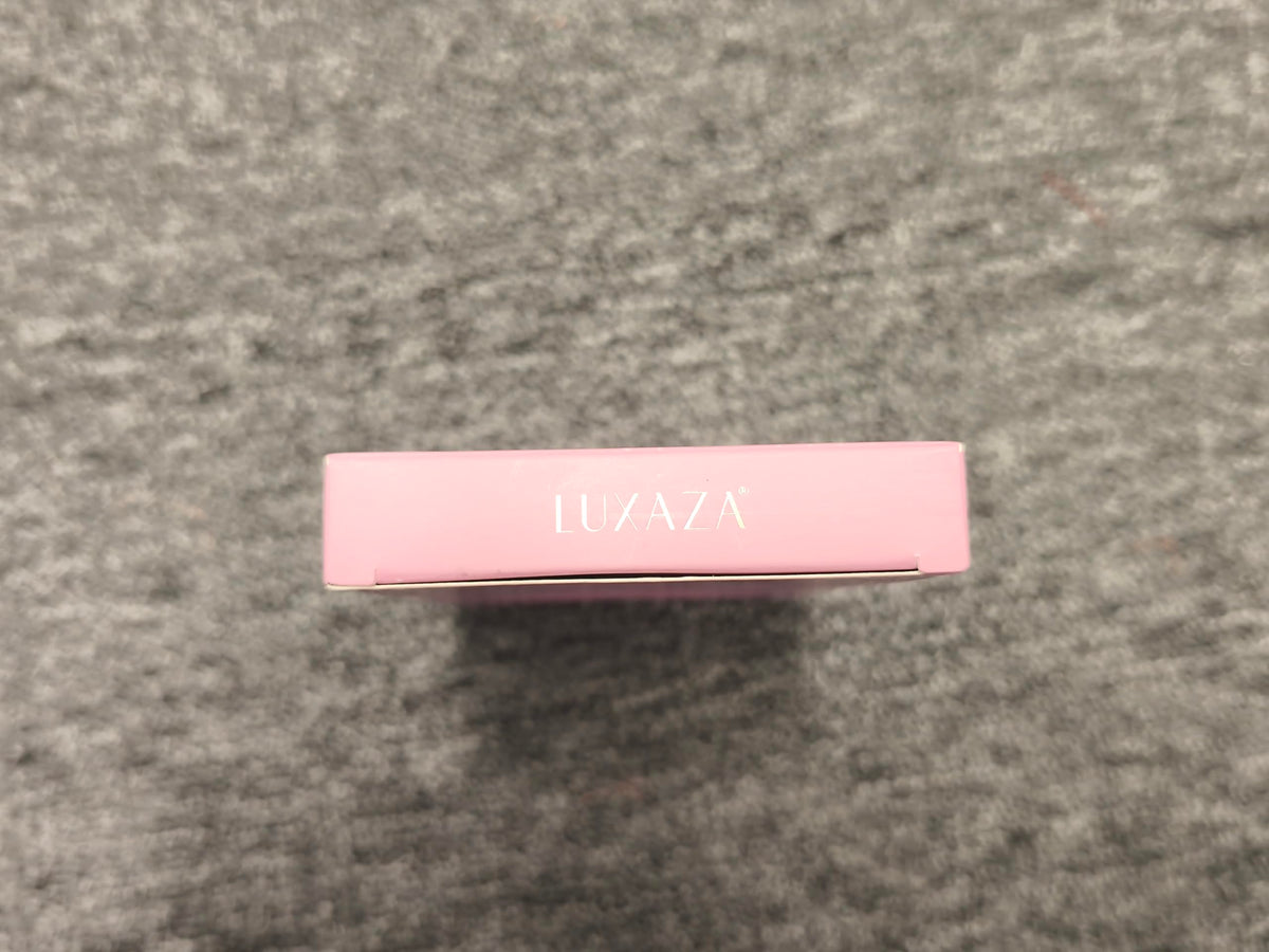 LUXAZA Cream Eyeshadow Stick in blue shade applied on eyelid