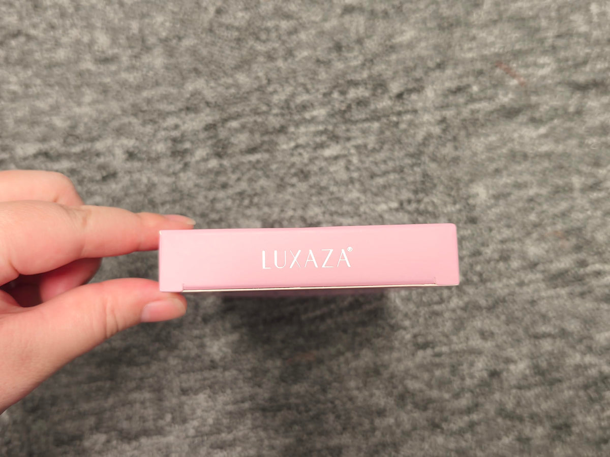 LUXAZA Cream Eyeshadow Stick in burgundy shade applied on eyelid