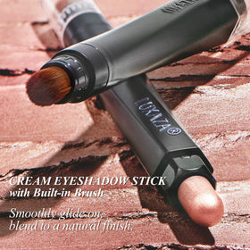 LUXAZA PRO eyeshadow sticks in neutral shades on a vanity