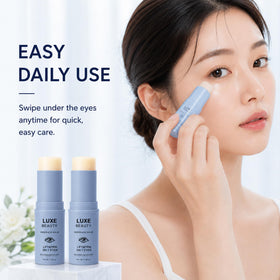 LUXE BEAUTY Under-Eye Balm Stick in a travel setting