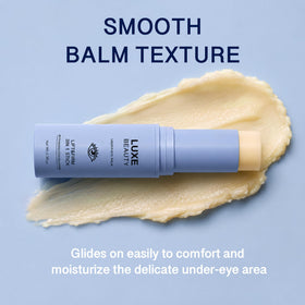 LUXE BEAUTY Under-Eye Balm Stick open showing the balm