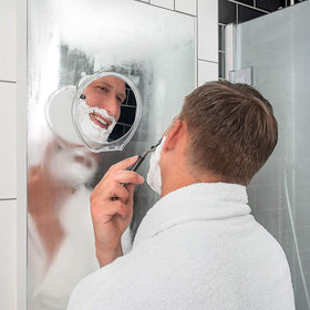 Luxo Shaving Mirror on a tiled bathroom wall