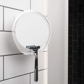 Luxo Shaving Mirror with razor holder attached