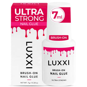 LUXXI Brush On Nail Glue 2-Pack set on a vanity