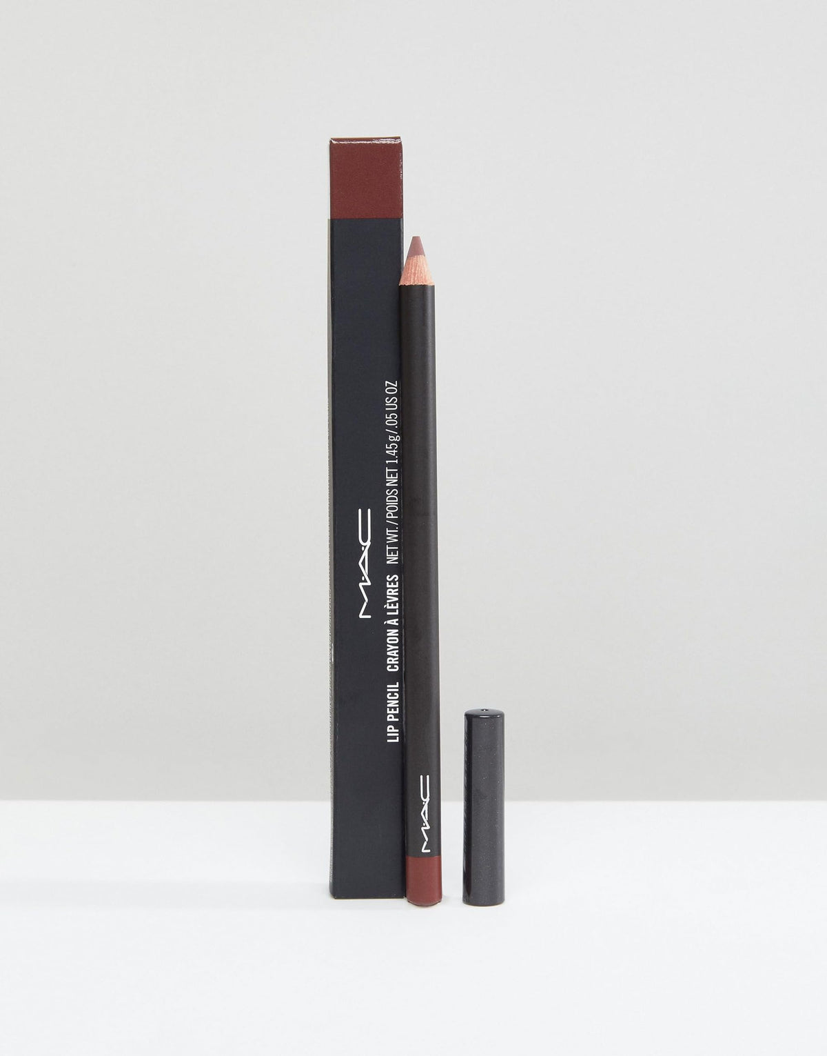 MAC Lip Pencil Mahogany swatch on skin