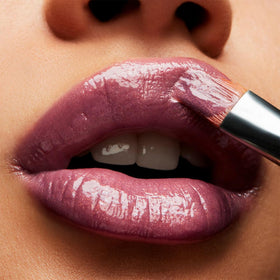 MAC Lipglass LOVECHILD swatch on skin