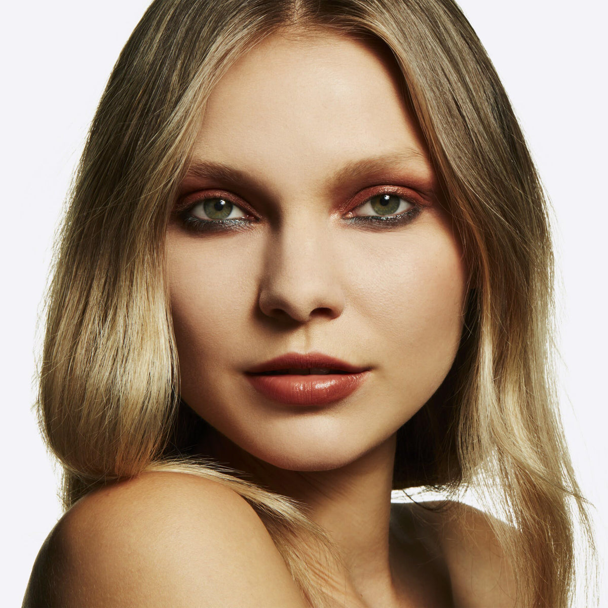 MAC Pro Longwear Concealer NW #20 being applied under eyes