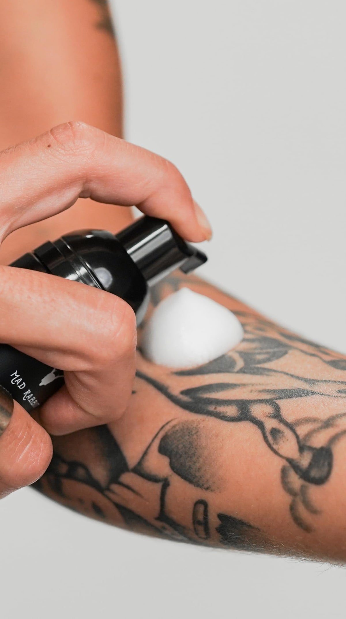 Mad Rabbit Tattoo Aftercare Soap on bathroom shelf