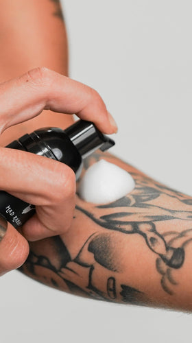 Mad Rabbit Tattoo Aftercare Soap on bathroom shelf