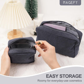 MAGEFY Makeup Bag set on a travel suitcase