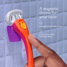 Magnetic holder for Billie razor mounted on shower wall