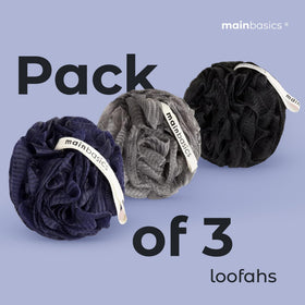 MainBasics loofah sponge in hand demonstrating size