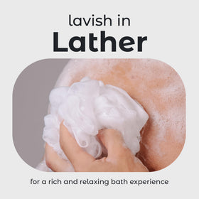 MainBasics Shower Loofah Sponge in use during a shower