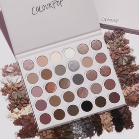 Makeup brush applying ColourPop Stone Cold Fox Eyeshadow