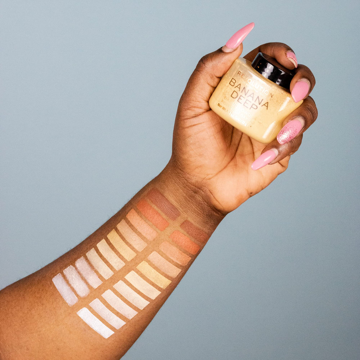 Makeup Revolution Loose Baking Powder Banana Light in use