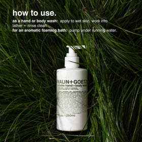 MALIN+GOETZ Hand + Body Wash 16 fl oz in a bathroom setting