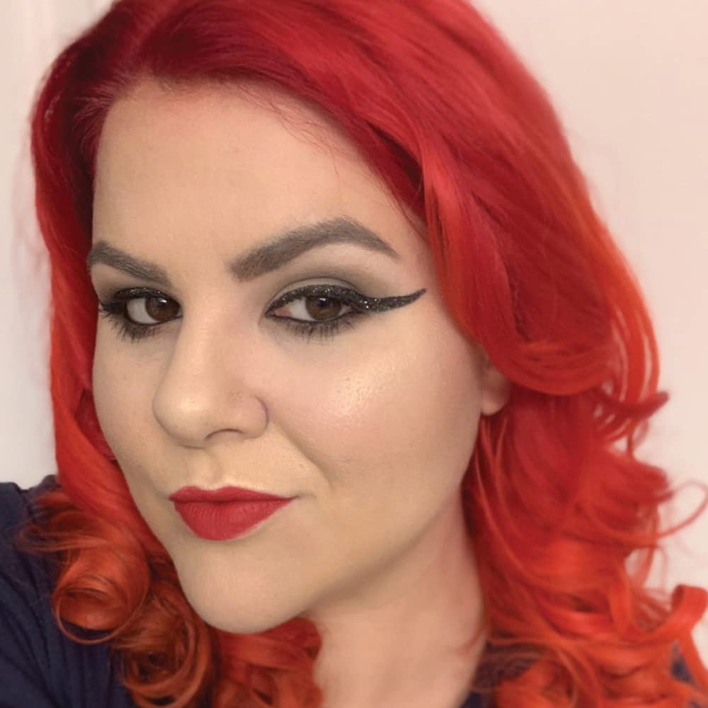 MANIC PANIC Wildfire Hair Dye glowing under black light