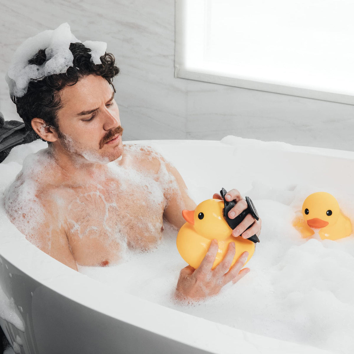 MANSCAPED Body Buffer silicone scrubber with body wash