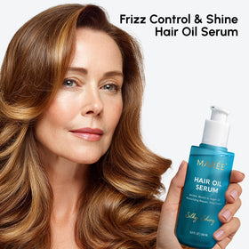 MAREE Hair Oil 3 Pack displayed on a wooden surface