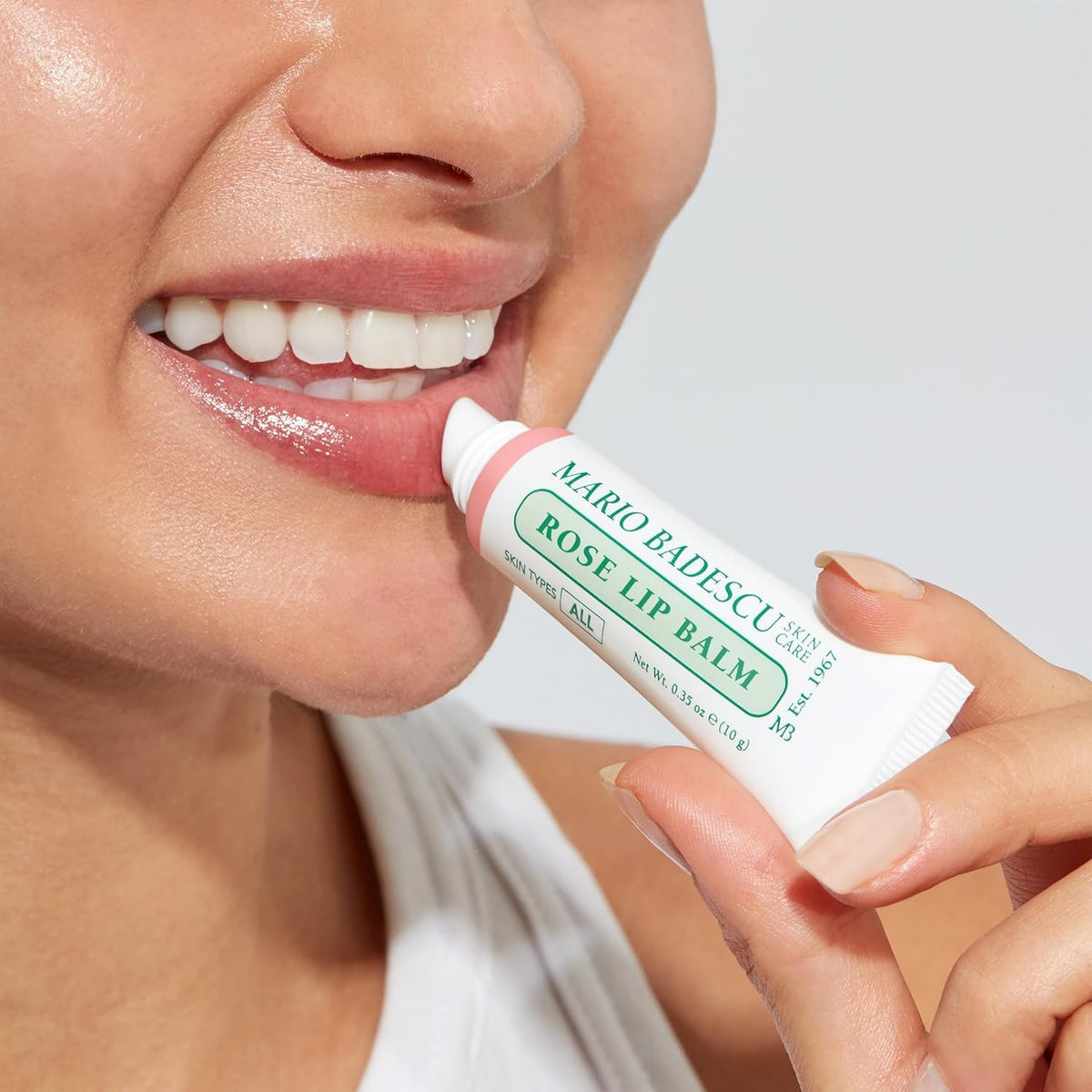 Mario Badescu Rose Lip Balm applied on lips