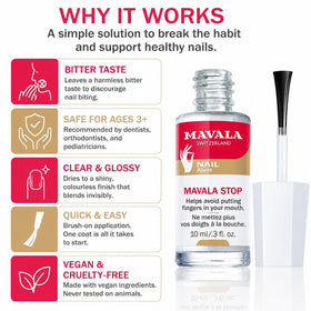 MAVALA Stop Nail Polish on a table with nail care items